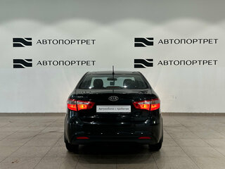 2012 Kia Rio 5-speed III, чёрный, 699000 рублей, вид 5