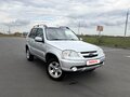 2012 Chevrolet Niva I Рестайлинг, серебристый - вид 1