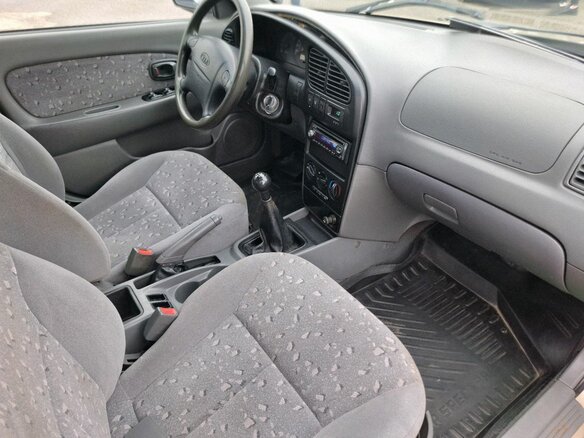 2009 Kia Spectra I Рестайлинг 2, серебристый - вид 13