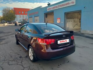 2011 Kia Cerato 6-speed II, пурпурный, 580000 рублей, вид 2