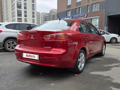 2008 Mitsubishi Lancer X, красный, 580000 рублей, вид 3
