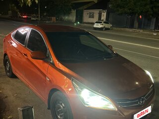 2015 Hyundai Solaris I Рестайлинг, оранжевый, 670000 рублей, вид 4