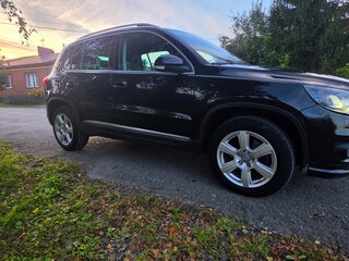 2012 Volkswagen Tiguan I Рестайлинг, чёрный, 1150000 рублей, вид 2