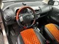 2007 Nissan Note I, коричневый, 550000 рублей - вид 8