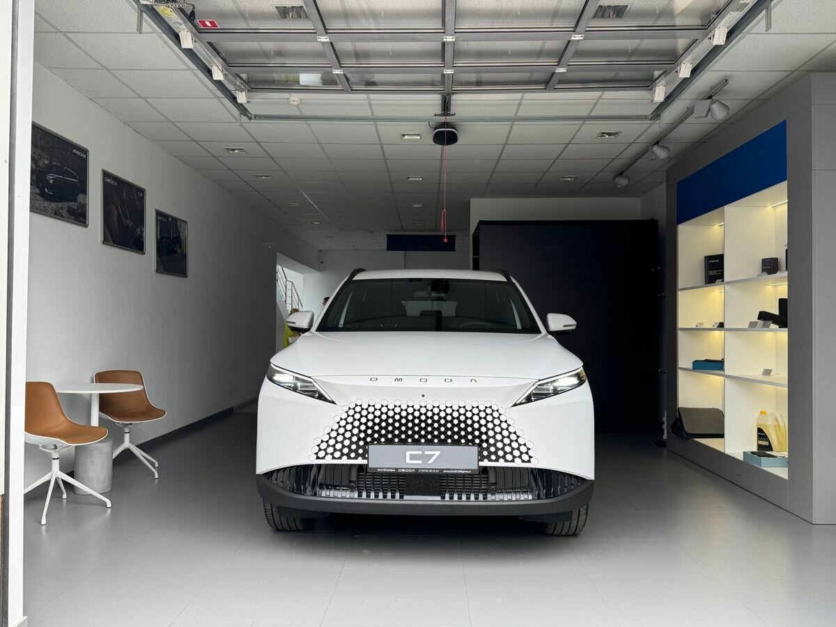 Открыть фотографии: Omoda C7