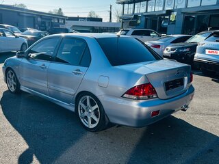 2005 Mitsubishi Lancer IX Рестайлинг, серебристый, 660000 рублей, вид 5