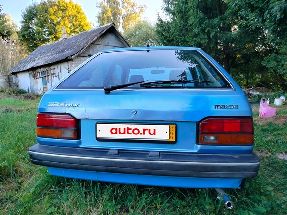 1987 Mazda 323 III (BF), синий - вид 1