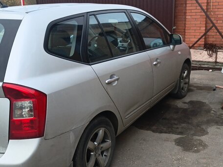2009 Kia Carens II (UN), серый, вид 3