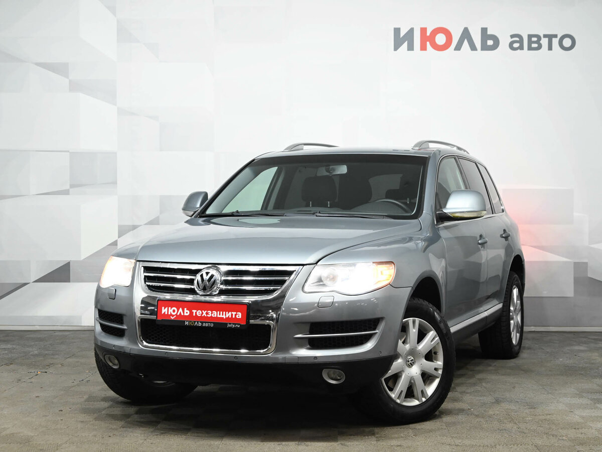 Открыть фотографии: Volkswagen Touareg I Рестайлинг