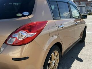 2009 Nissan Tiida I, золотистый, 790000 рублей, вид 3
