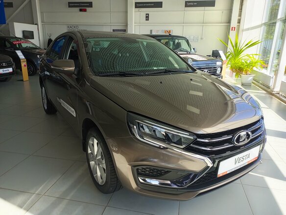 2026 Lada (ВАЗ) Vesta I Рестайлинг (NG), коричневый - вид 1