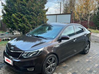 2015 Kia Rio III Рестайлинг, коричневый, 750000 рублей, вид 1