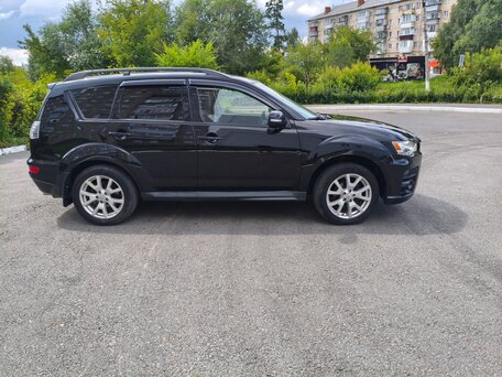 2011 Mitsubishi Outlander II Рестайлинг, чёрный, 880000 рублей, вид 3