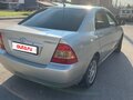 2005 Toyota Corolla IX (E120, E130) Рестайлинг, серебристый - вид 3