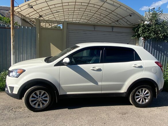2014 SsangYong Actyon II Рестайлинг, белый, 1195000 рублей - вид 4