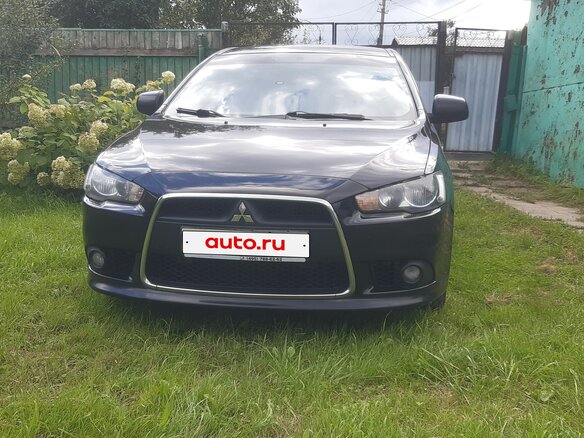 2012 Mitsubishi Lancer X Рестайлинг, чёрный, 1050000 рублей - вид 4