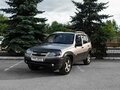 2010 Chevrolet Niva I Рестайлинг, серебристый, 444000 рублей - вид 2