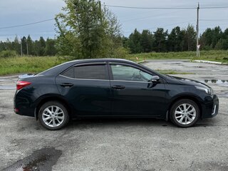 2014 Toyota Corolla XI (E160, E170, E180), чёрный, 1300000 рублей, вид 2