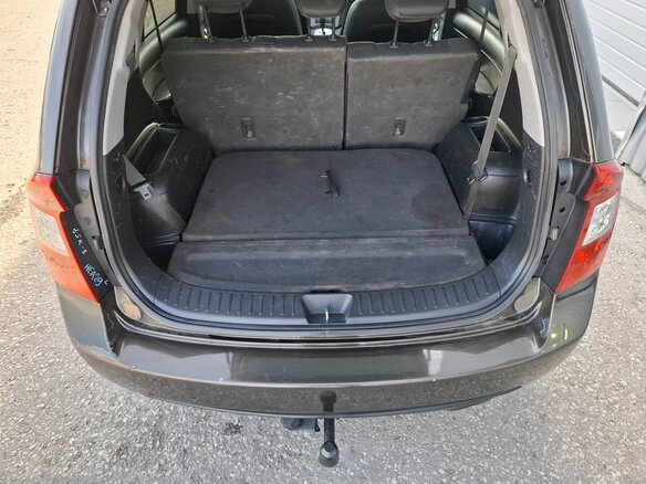 2010 Kia Carens II (UN), коричневый, 740000 рублей - вид 14