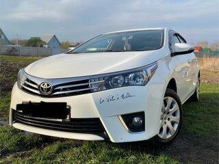 2014 Toyota Corolla XI (E160, E170, E180), белый, 1450000 рублей, вид 2