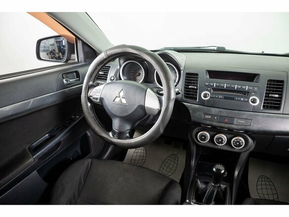 2007 Mitsubishi Lancer X, чёрный - вид 10