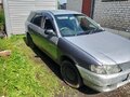 2000 Mazda Familia Y11, серебристый - вид 3