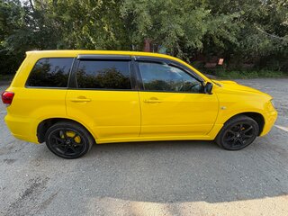 2002 Mitsubishi Airtrek I, жёлтый, 365000 рублей, вид 3