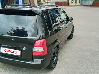 2001 Mazda Demio I (DW), чёрный, 239000 рублей, вид 2