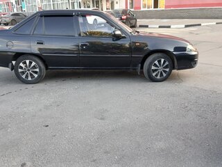 2012 Daewoo Nexia I Рестайлинг, чёрный, 175000 рублей, вид 3