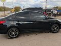 2011 Hyundai Solaris I, чёрный, 750000 рублей - вид 3