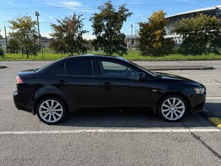 2013 Mitsubishi Lancer X Рестайлинг, чёрный, 830000 рублей, вид 3