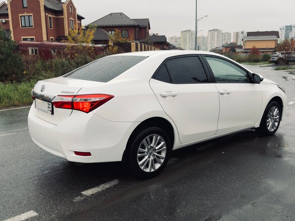 2014 Toyota Corolla XI (E160, E170, E180), белый, 1449000 рублей - вид 1