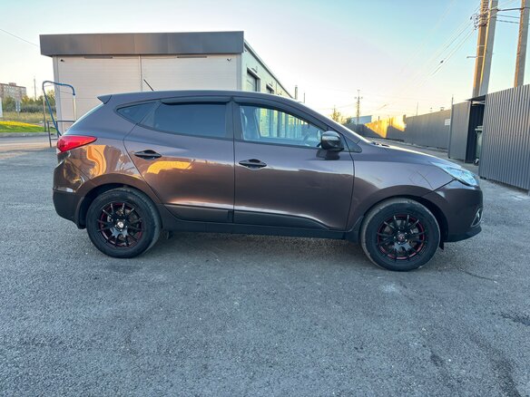 2012 Hyundai ix35 I, коричневый - вид 4