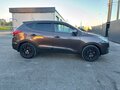 2012 Hyundai ix35 I, коричневый - вид 4