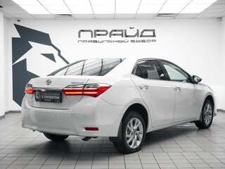 2016 Toyota Corolla XI (E160, E170, E180) Рестайлинг 1, белый, 1790000 рублей, вид 3