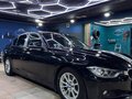 2012 BMW 3 серии 320i VI (F3x), чёрный, 1700000 рублей
