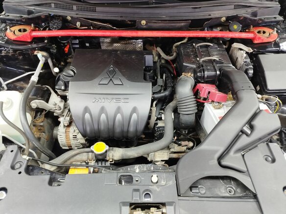 2010 Mitsubishi Lancer X, чёрный, 750000 рублей - вид 10
