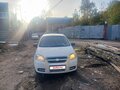 2011 Chevrolet Aveo I Рестайлинг, белый - вид 1