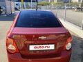 2012 Chevrolet Aveo II, красный, 650000 рублей - вид 5