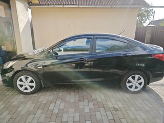 2011 Hyundai Solaris I, чёрный, 610000 рублей, вид 4