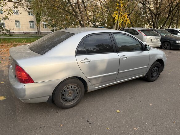 2005 Toyota Corolla IX (E120, E130) Рестайлинг, серебристый, 430000 рублей - вид 3