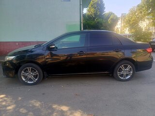 2010 Toyota Corolla X (E140, E150) Рестайлинг, чёрный, 700000 рублей, вид 4