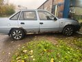 2012 Daewoo Nexia I Рестайлинг, серый - вид 1