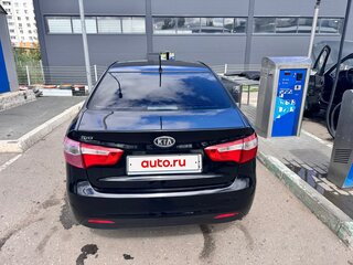 2012 Kia Rio 4-speed III, чёрный, 700000 рублей, вид 3