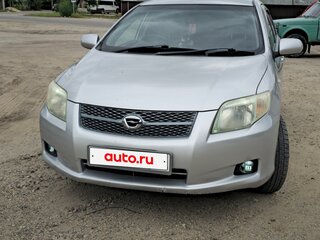 2008 Toyota Corolla Axio X (E140, E150), серый, 690000 рублей, вид 1