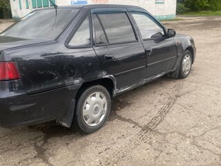 2011 Daewoo Nexia I Рестайлинг, чёрный, 125000 рублей, вид 2