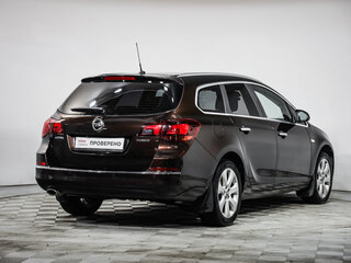 2013 Opel Astra J Рестайлинг, коричневый, 699777 рублей, вид 5