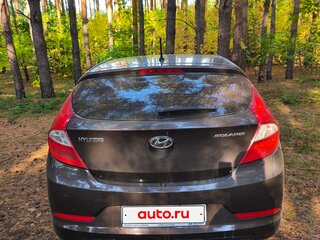 2015 Hyundai Solaris I Рестайлинг, коричневый, 730000 рублей, вид 3