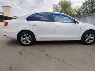 2015 Volkswagen Jetta VI Рестайлинг, белый, 920000 рублей, вид 4