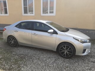 2013 Toyota Corolla XI (E160, E170, E180), серебристый, 1290000 рублей, вид 4
